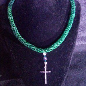 Hand Crafted Green Tubular beaded necklace with a Silver Cross